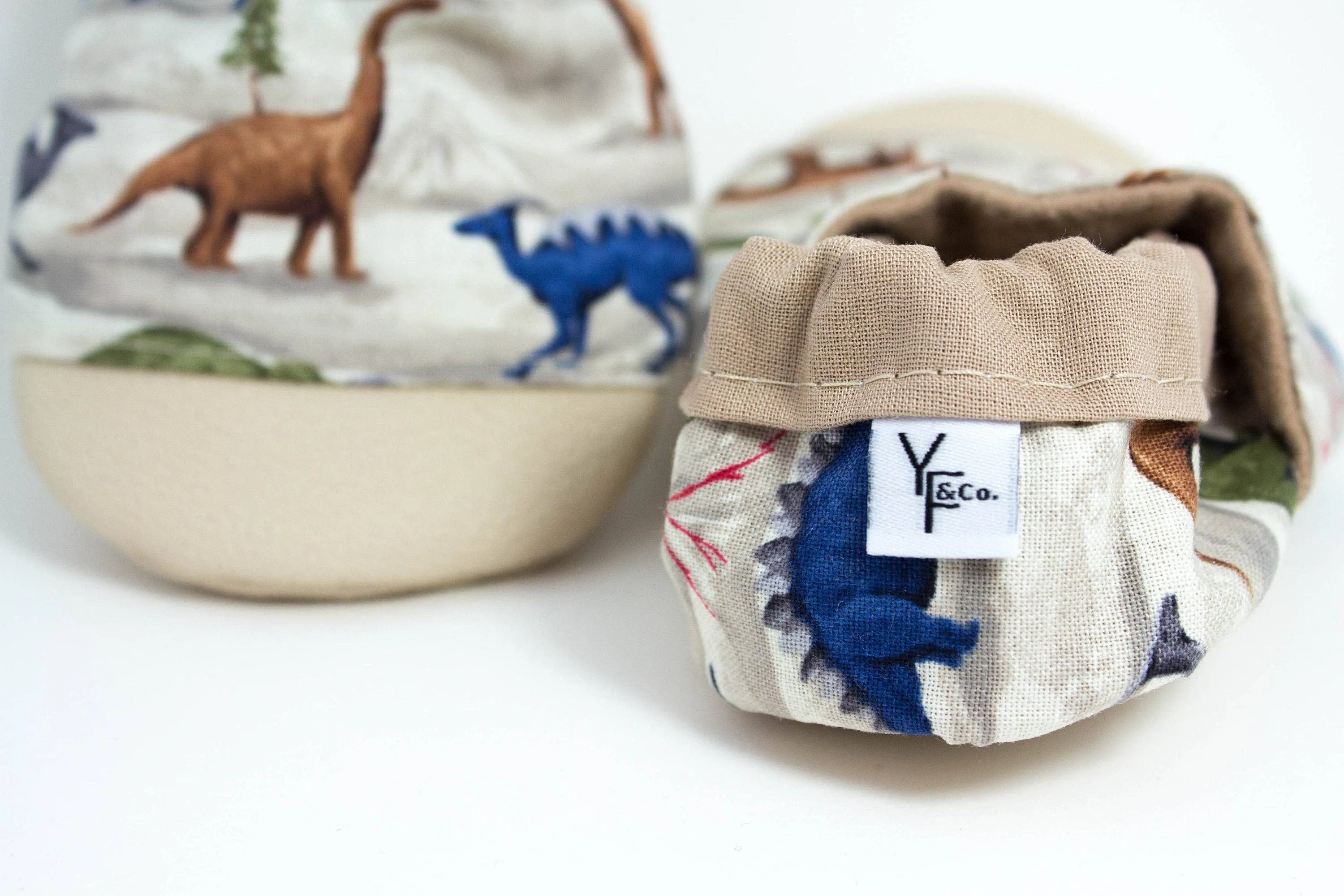 Yeti Feet & Company - Non-Slip Tan Dinosaur Baby Moccs